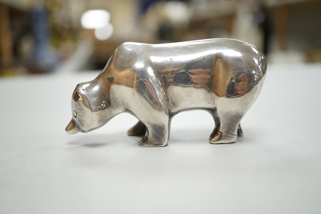 A stylised white metal(stamped 925) miniature model of a bear, length 85mm, height 42mm, 18oz.
